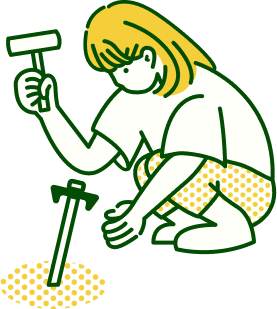 キャンプ場でテント設営する女性のイラスト